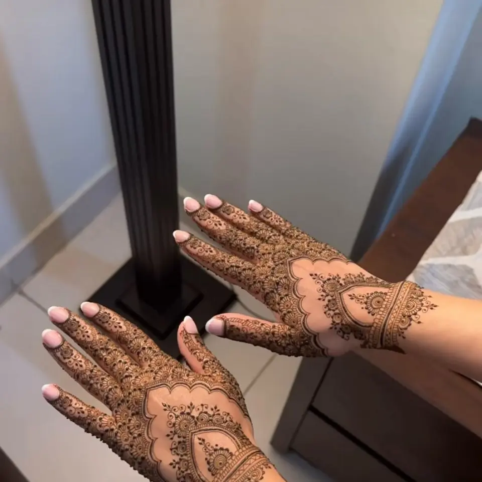 front hand flower mehndi design